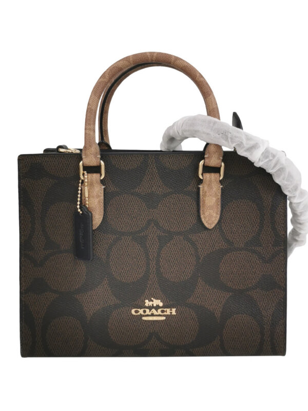 Винтажная сумка Coach Maggie