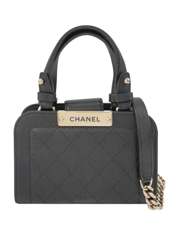 Винтажная сумка Chanel Quilted Calfskin Logo Crossbody